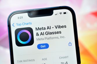Close-up of a smartphone screen displaying the App Store listing for Meta AI - Vibes & AI Glasses by Meta Platforms, Inc., showing the app icon and Get button.