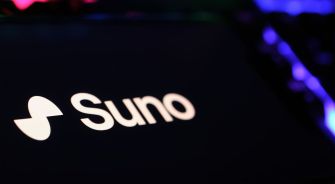 Close-up of the Suno logo on a dark background.