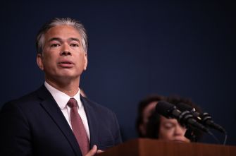 California Attorney General Rob Bonta speaks at a podium.