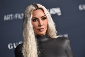 Kim Kardashian poses at a red-carpet event.