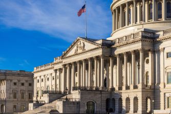 U.S. Capitol building under a blue sky, representing the House vote on the Russia sanctions bill.