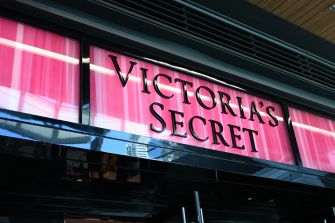 Victoria’s Secret storefront sign above a store entrance.