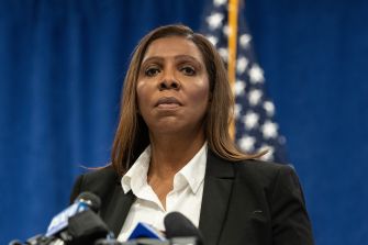 New York Attorney General Letitia James speaks at a podium during a press conference.