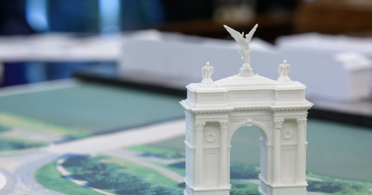 Photo: lawcommentary.com Scale model of the proposed 250-foot Independence Arch displayed on a map near Arlington National Cemetery