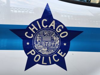 Chicago Police star emblem on the side of a police vehicle.