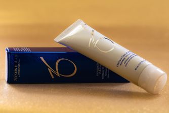 ZO Skin Health skincare tube resting on its branded box.