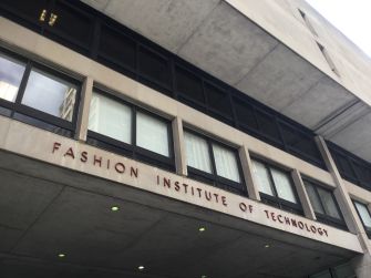 Exterior of the Fashion Institute of Technology building with its name displayed above the entrance.