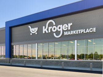 Kroger Marketplace storefront with the retailer’s logo above the glass entrance.