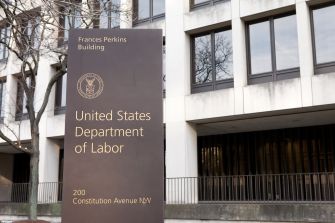 Sign outside the United States Department of Labor building.