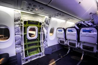 Interior view of a Boeing 737 MAX 9 showing the area around the door plug that became dislodged during a flight, causing significant safety concerns.