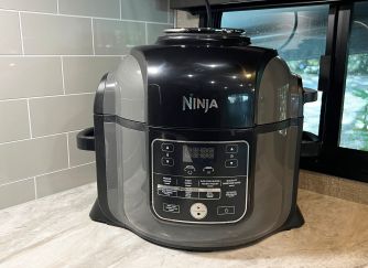 Image of a Ninja Foodi pressure cooker on a countertop.