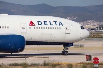 Delta Airlines aircraft on the runway.