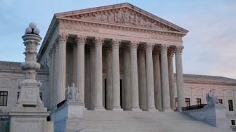 U.S. Supreme Court building with columns and steps, reflecting the institution's significance in legal decisions.