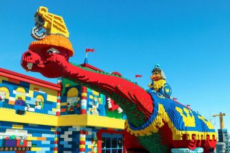 Colorful Lego dinosaur sculpture outside the Legoland theme park.