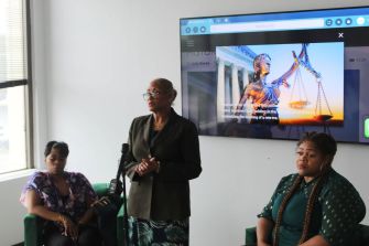 A press conference featuring parents and an attorney discussing a lawsuit against a Detroit school district for alleged abuse of special needs children.