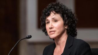 U.S. District Judge Deborah Boardman speaking during a court session.