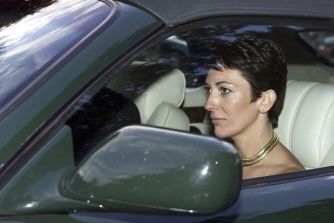 Ghislaine Maxwell sitting in a car, reflecting a moment of contemplation.