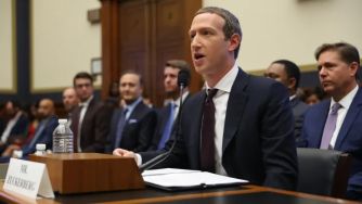 Mark Zuckerberg testifying before Congress regarding misinformation on Facebook.