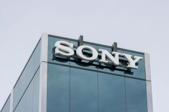 Close-up of the Sony logo on a glass office building.