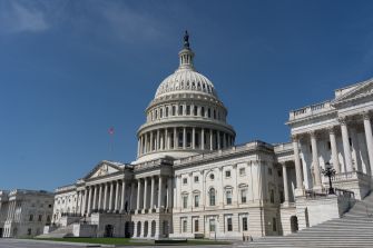 The United States Capitol building on a clear day.