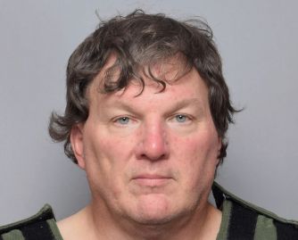 Mugshot of Rex Heuermann, the suspected Gilgo Beach serial killer, taken after his arrest.