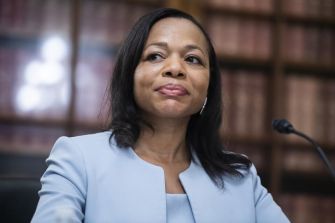 Assistant Attorney General Kristen Clarke speaking during a press event.