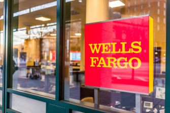 Wells Fargo bank sign displayed on a storefront.
