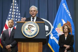 Attorney General Merrick B. Garland announces indictments related to fentanyl trafficking at a Department of Justice press conference.