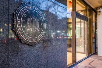 Seal of the Federal Bureau of Investigation (FBI) displayed on the entrance of its building.