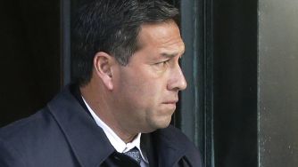 Former UCLA men's soccer coach Jorge Salcedo leaving a courthouse after being sentenced for his involvement in the college admissions bribery scandal.