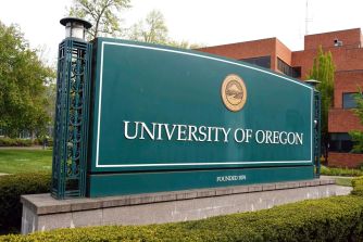 Signage at the entrance of the University of Oregon campus.