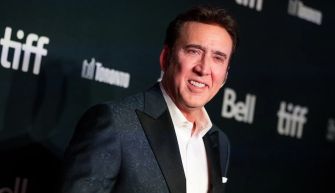 Image of Weston Cage and Nicolas Cage at a public event.