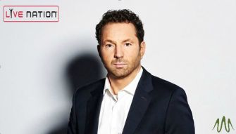 Live Nation CEO Michael Rapino, who is ordered to testify in the Astroworld disaster lawsuits, posing for a photo.