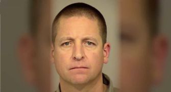 Mugshot of an off-duty officer involved in a shooting incident while intoxicated.