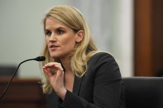 Frances Haugen testifying before a Senate committee about Facebook's impact on teens and the need for transparency in social media platforms.