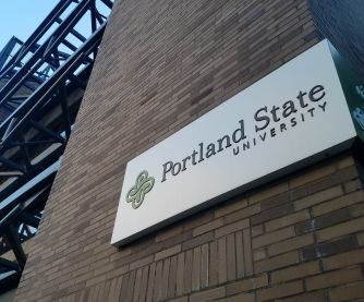 Portland State University sign on a brick building.