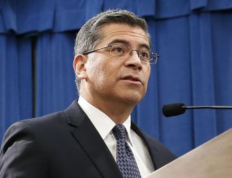 California Attorney General Xavier Becerra making a statement.