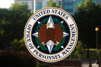 Seal of the United States Office of Personnel Management displayed on a window.