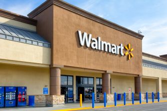 Exterior view of a Walmart store with signage and entrance visible.
