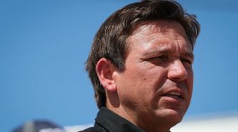Governor Ron DeSantis speaking during a public event.