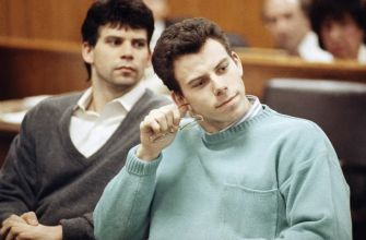 Two men, seated in a courtroom setting, appear deep in thought as they await proceedings related to their high-profile case.